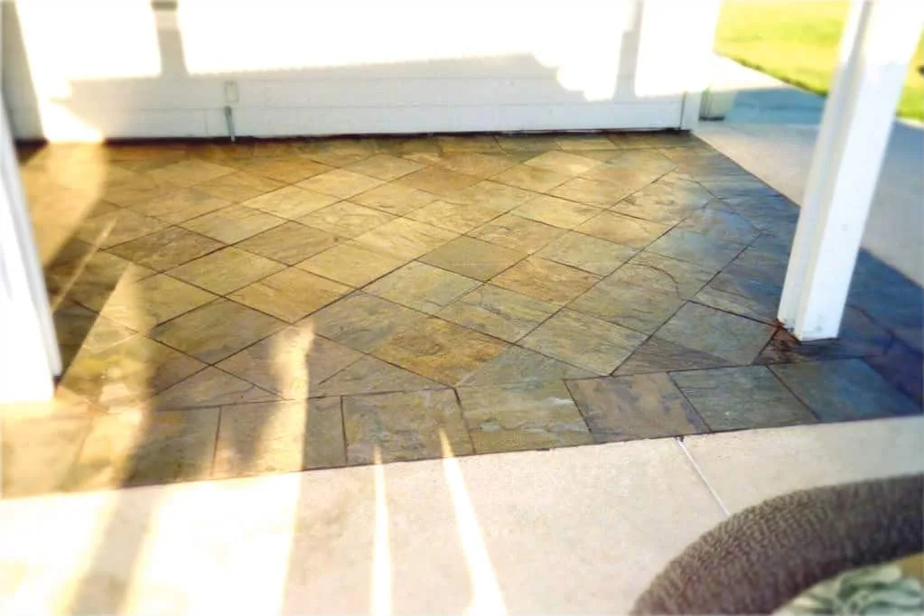 Slate-look tile laid in a running pattern by a doorway
